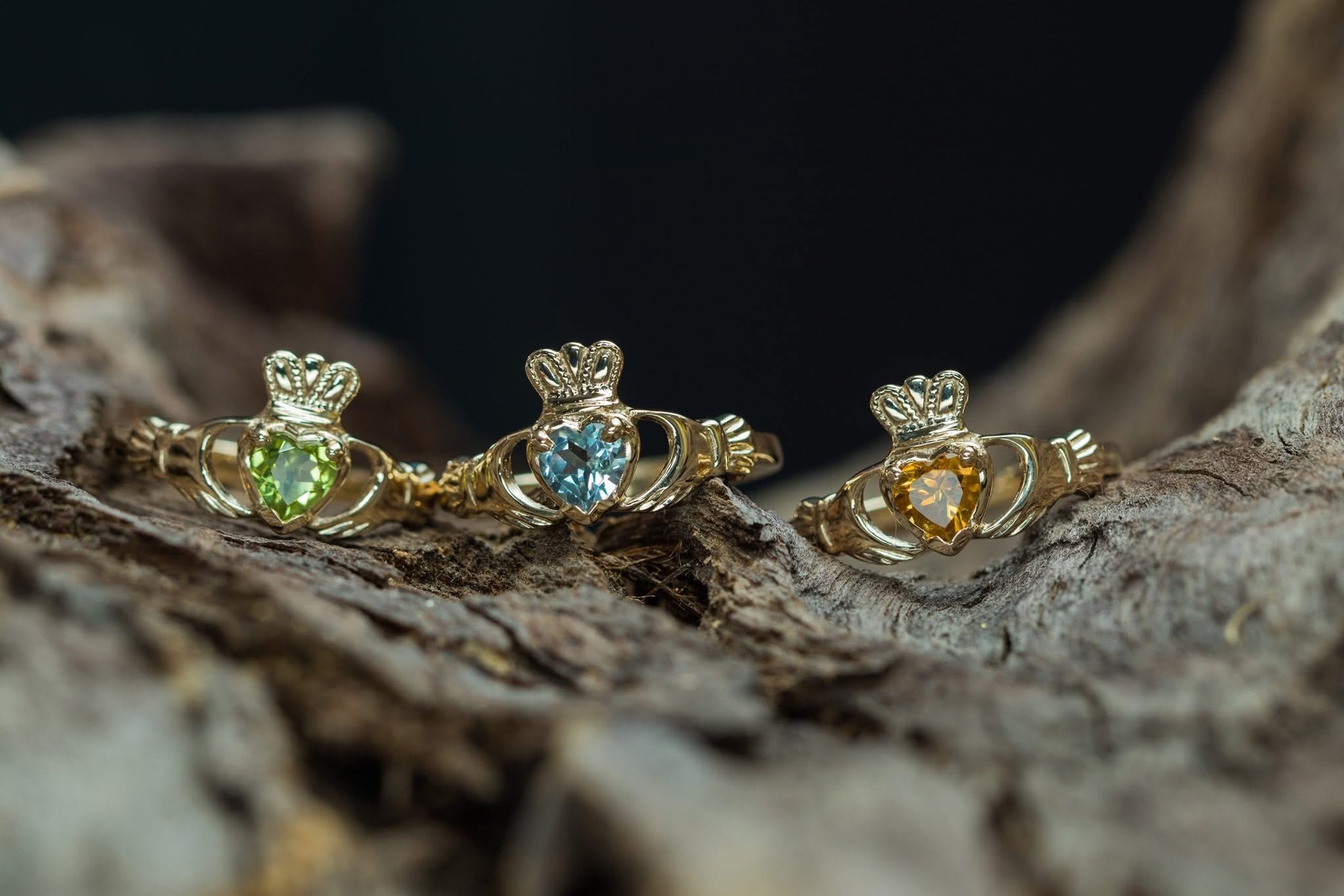 Claddagh birthstone rings in gold and silver — twelve gemstones, one for every birth month