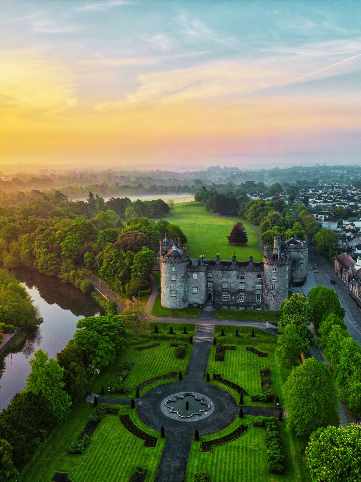 Kilkenny Castle and its formal gardens seen from the River Nore, County Kilkenny, Ireland