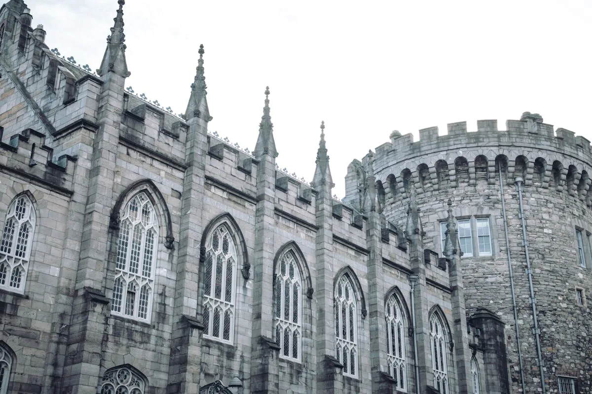 Dublin Castle hallmark stamps on the inside of a gold Claddagh ring — maker's mark, fineness, crowned harp, date letter